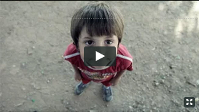 Spanish child looking at camera