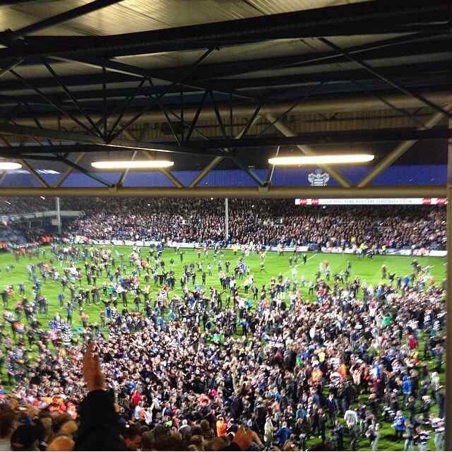 QPR fans on the pitch at Loftus Road