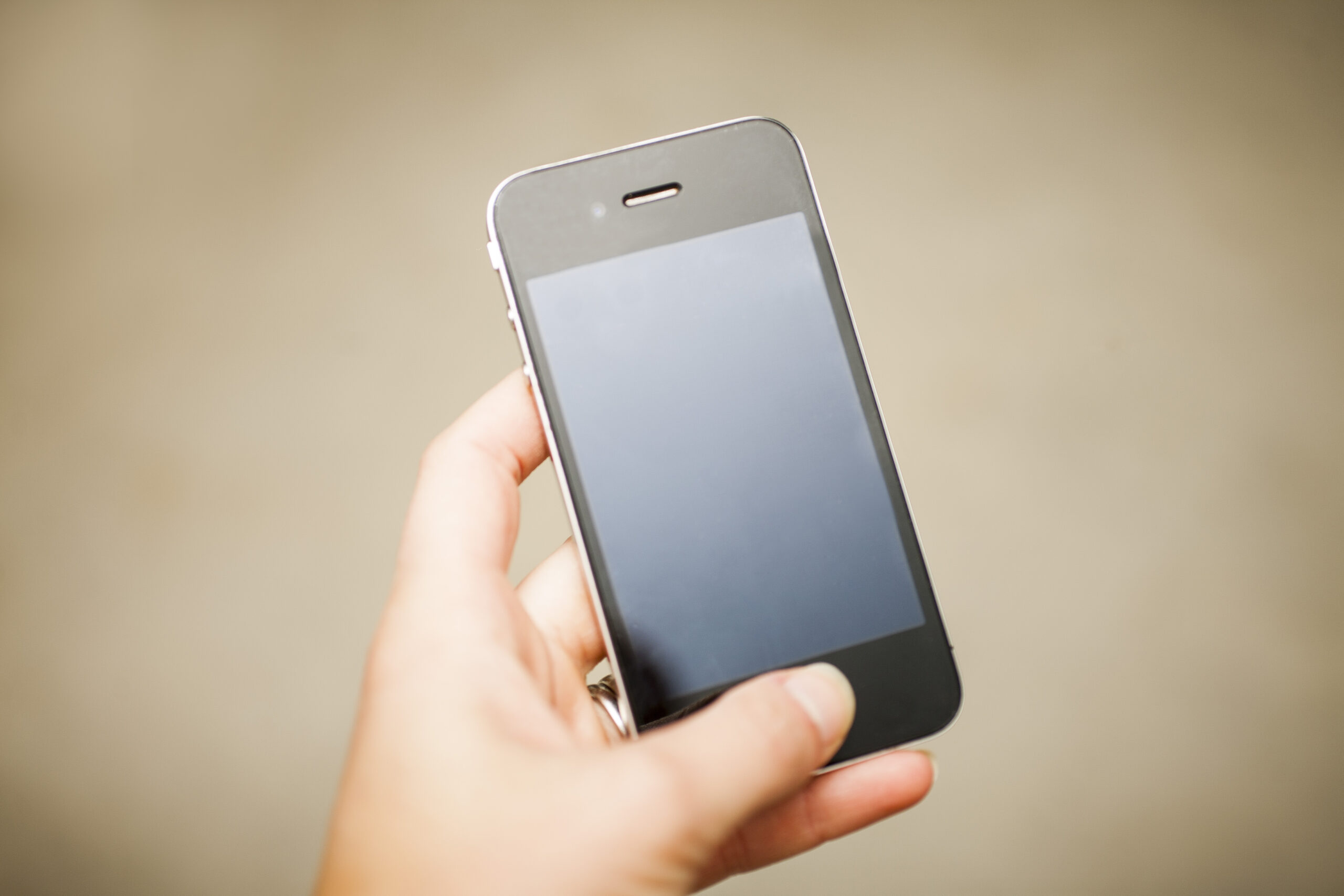 Hand holding a mobile phone