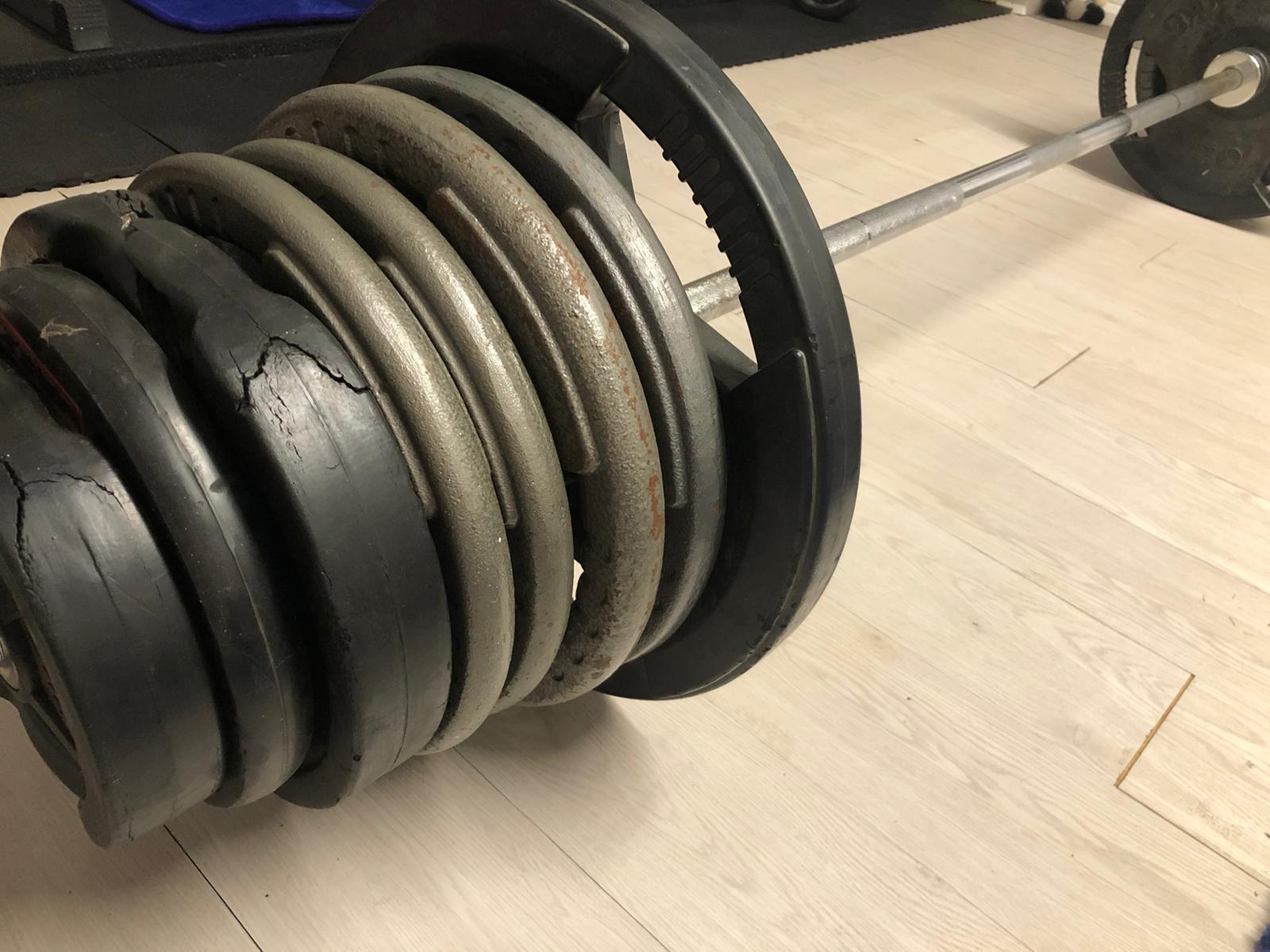 Weights on a bar (for weight lifting)